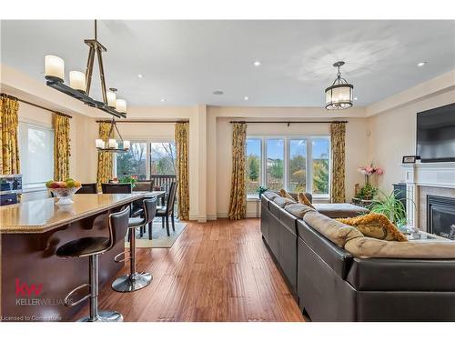 691 Robert Ferrie Drive, Kitchener, ON - Indoor Photo Showing Living Room With Fireplace