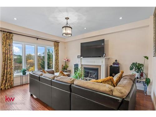 691 Robert Ferrie Drive, Kitchener, ON - Indoor Photo Showing Living Room With Fireplace