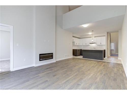 40-4311 Mann Street, Niagara Falls, ON - Indoor Photo Showing Living Room With Fireplace