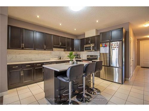 214 Poppy Drive E, Guelph, ON - Indoor Photo Showing Kitchen With Upgraded Kitchen