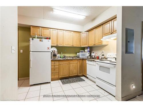 101-253 Lester Street, Waterloo, ON - Indoor Photo Showing Kitchen With Double Sink