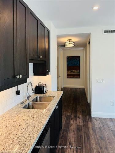 417-118 King Street E, Hamilton, ON - Indoor Photo Showing Kitchen With Double Sink