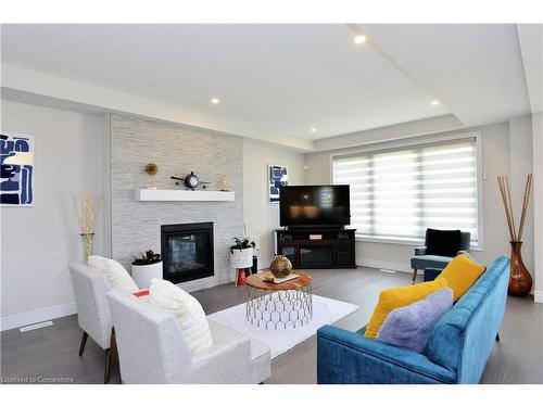 50 Tindall Cres Crescent, East Luther-Grand Valley, ON - Indoor Photo Showing Living Room With Fireplace