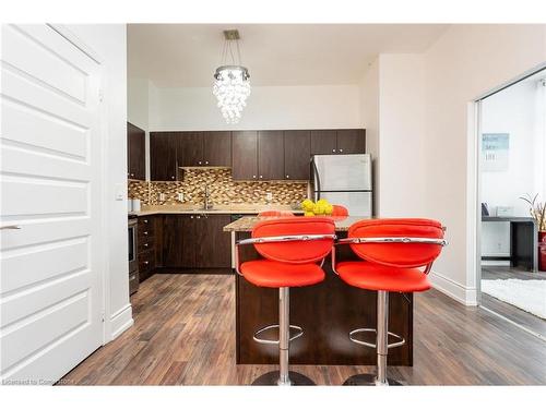 102-215 Queen Street, Brampton, ON - Indoor Photo Showing Kitchen With Double Sink