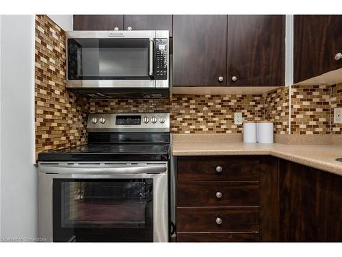 102-215 Queen Street, Brampton, ON - Indoor Photo Showing Kitchen