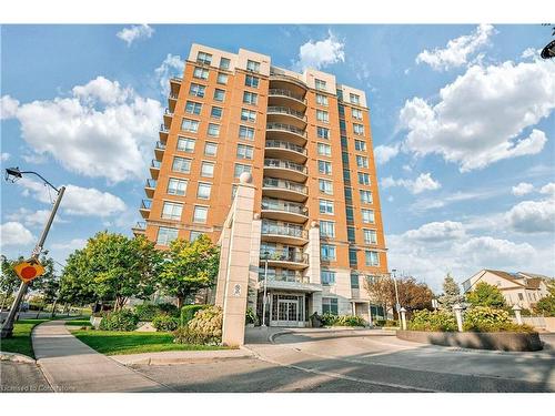 412-2365 Central Park Drive, Oakville, ON - Outdoor With Balcony With Facade