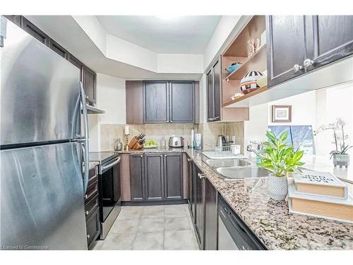 412-2365 Central Park Drive, Oakville, ON - Indoor Photo Showing Kitchen With Double Sink With Upgraded Kitchen