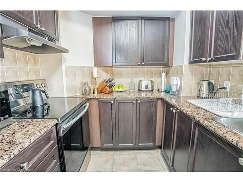 412-2365 Central Park Drive, Oakville, ON - Indoor Photo Showing Kitchen