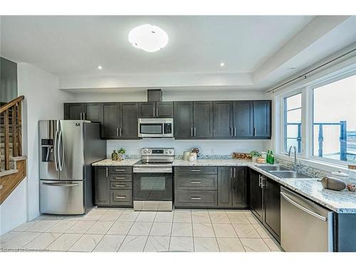 239-30 Times Square Boulevard, Hamilton, ON - Indoor Photo Showing Kitchen With Double Sink With Upgraded Kitchen