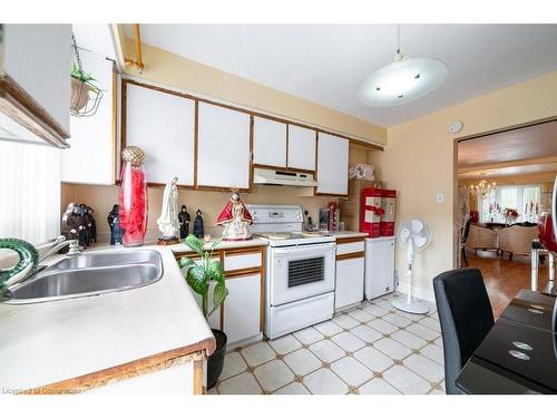 13 Rolyat Street, Toronto, ON - Indoor Photo Showing Kitchen With Double Sink