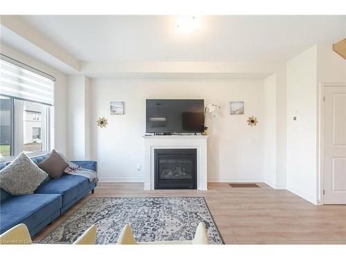 23 Povey Road, Fergus, ON - Indoor Photo Showing Living Room With Fireplace