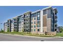 406-620 Sauve Street, Milton, ON  - Outdoor With Balcony With Facade 