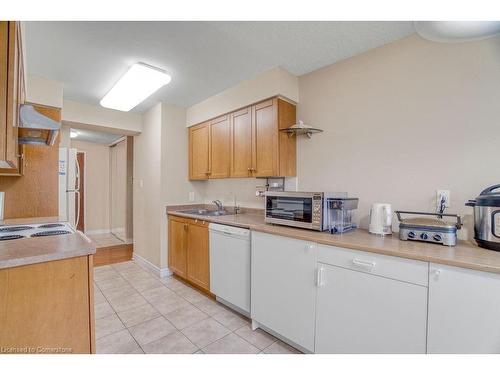 2107-156 Enfield Place, Mississauga, ON - Indoor Photo Showing Kitchen With Double Sink