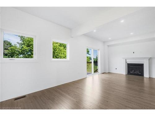 327 Quebec Street, Stayner, ON - Indoor Photo Showing Living Room With Fireplace