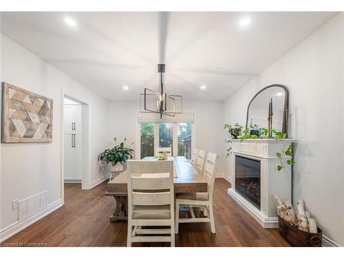 Burlington, ON - Indoor Photo Showing Dining Room With Fireplace