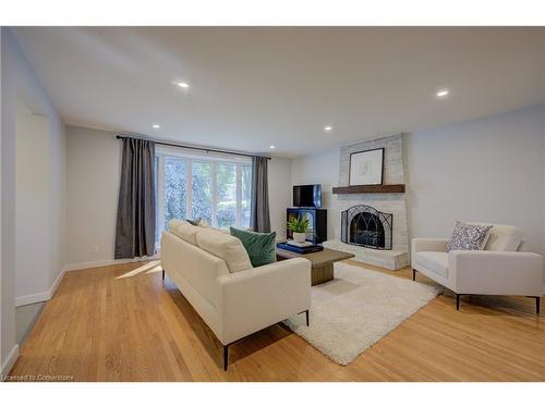 #Upper-18 Jay Court, Kitchener, ON - Indoor Photo Showing Living Room With Fireplace