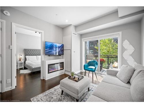 226-128 Grovewood Common, Oakville, ON - Indoor Photo Showing Living Room With Fireplace