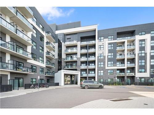 226-128 Grovewood Common, Oakville, ON - Outdoor With Balcony With Facade