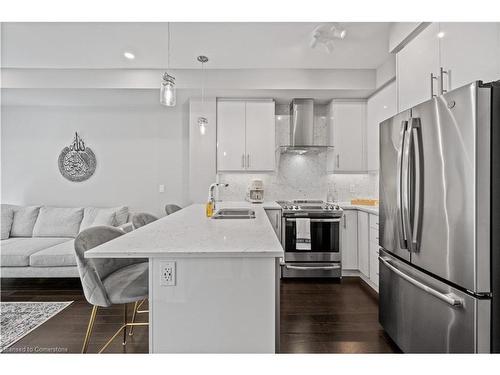 226-128 Grovewood Common, Oakville, ON - Indoor Photo Showing Kitchen With Double Sink With Upgraded Kitchen