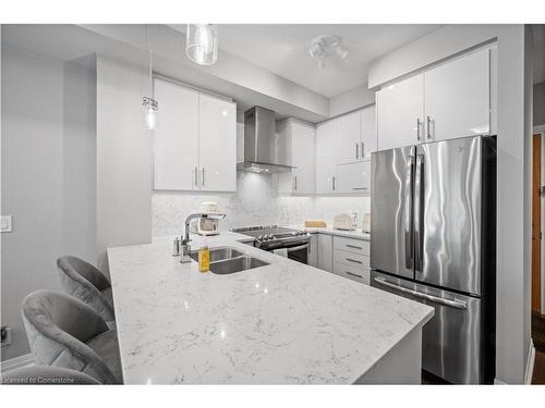 226-128 Grovewood Common, Oakville, ON - Indoor Photo Showing Kitchen With Double Sink With Upgraded Kitchen