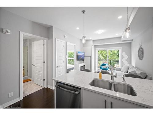 226-128 Grovewood Common, Oakville, ON - Indoor Photo Showing Kitchen With Double Sink