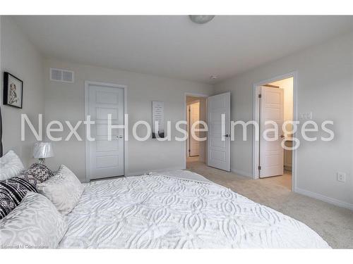 12-8317 Mulberry Drive, Niagara Falls, ON - Indoor Photo Showing Bedroom