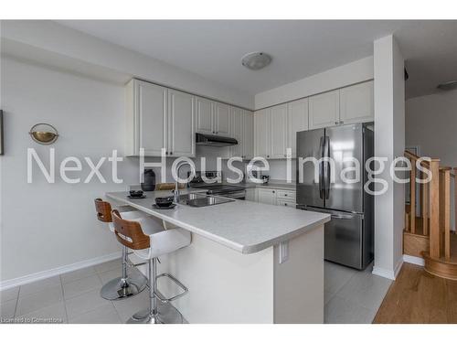 12-8317 Mulberry Drive, Niagara Falls, ON - Indoor Photo Showing Kitchen With Double Sink