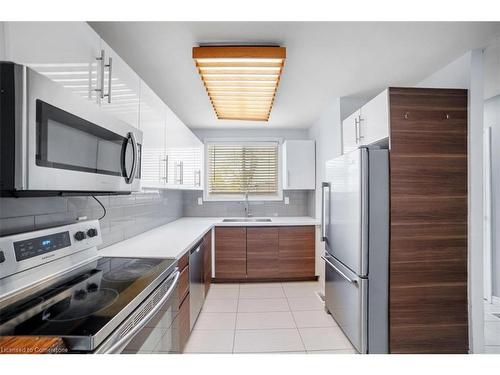 22-120 Quigley Road, Hamilton, ON - Indoor Photo Showing Kitchen With Stainless Steel Kitchen