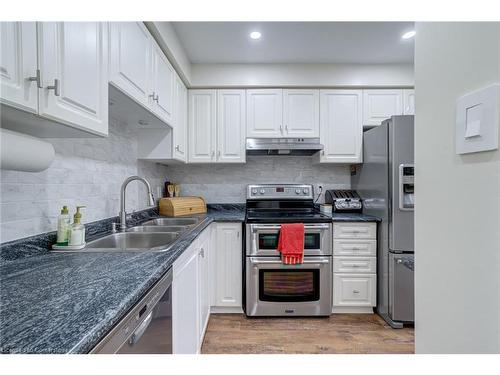 19-2880 Headon Forest Drive, Burlington, ON - Indoor Photo Showing Kitchen With Double Sink