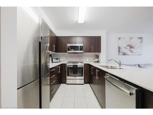 103-40 Via Rosedale, Brampton, ON - Indoor Photo Showing Kitchen With Stainless Steel Kitchen With Double Sink With Upgraded Kitchen