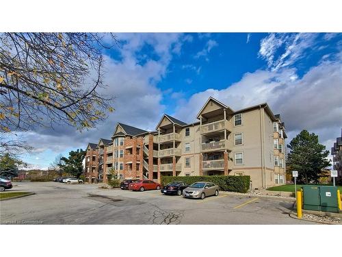 407-4013 Kilmer Drive, Burlington, ON - Outdoor With Balcony With Facade