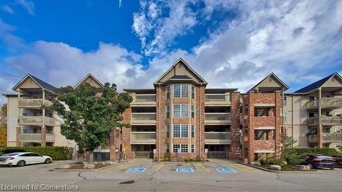 407-4013 Kilmer Drive, Burlington, ON - Outdoor With Balcony With Facade