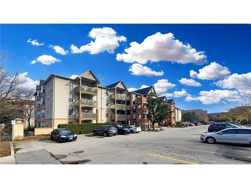 407-4013 Kilmer Drive, Burlington, ON - Outdoor With Balcony With Facade