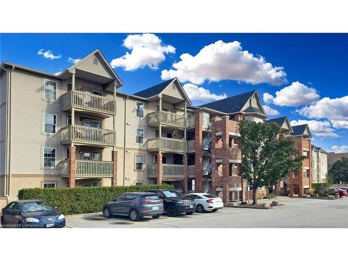 407-4013 Kilmer Drive, Burlington, ON - Outdoor With Balcony With Facade