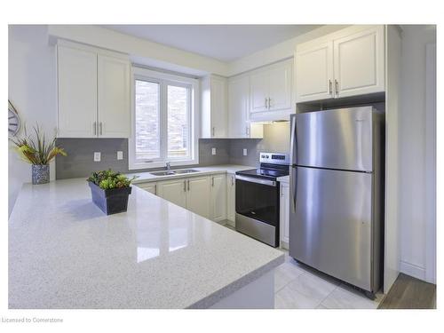 4 Harwood Street, Tillsonburg, ON - Indoor Photo Showing Kitchen With Stainless Steel Kitchen With Double Sink