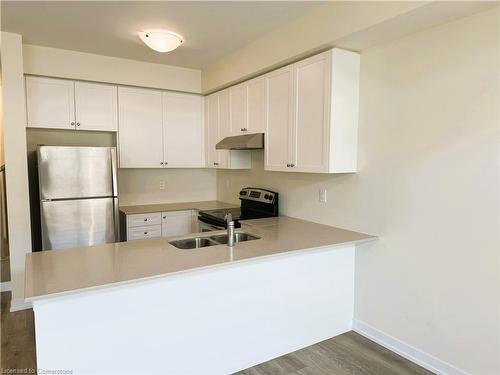 35-7789 Kalar Road, Niagara Falls, ON - Indoor Photo Showing Kitchen With Double Sink