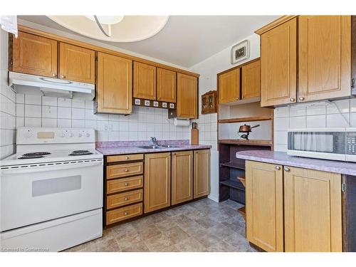 44-6650 Falconer Drive, Mississauga, ON - Indoor Photo Showing Kitchen With Double Sink