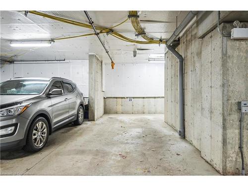 110-1440 Gordon Street, Guelph, ON - Indoor Photo Showing Garage