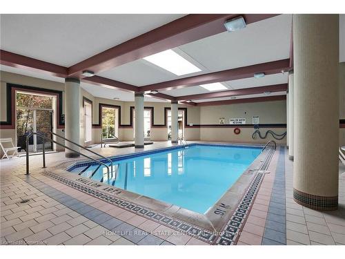 117-8111 Forest Glen Drive, Niagara Falls, ON - Indoor Photo Showing Other Room With In Ground Pool