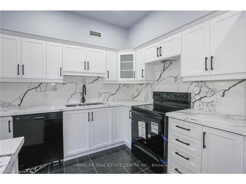 117-8111 Forest Glen Drive, Niagara Falls, ON - Indoor Photo Showing Kitchen