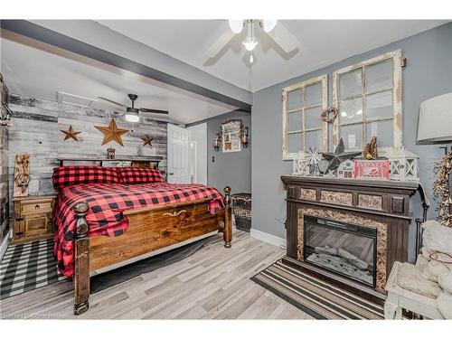 715 Tamarac Street, Dunnville, ON - Indoor Photo Showing Bedroom With Fireplace