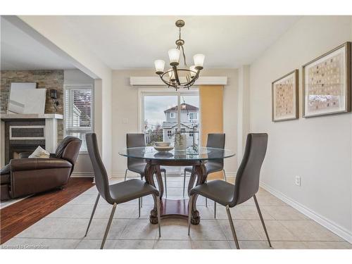 76 Griffiths Avenue, Cambridge, ON - Indoor Photo Showing Dining Room With Fireplace