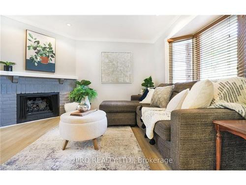 530 Roseheath Drive, Milton, ON - Indoor Photo Showing Living Room With Fireplace