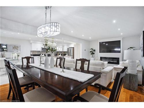 3070 Meadowgate Boulevard, London, ON - Indoor Photo Showing Dining Room With Fireplace