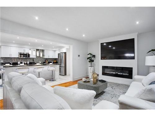 3070 Meadowgate Boulevard, London, ON - Indoor Photo Showing Living Room With Fireplace