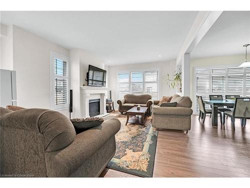 3 Aldgate Avenue, Hamilton, ON - Indoor Photo Showing Living Room With Fireplace