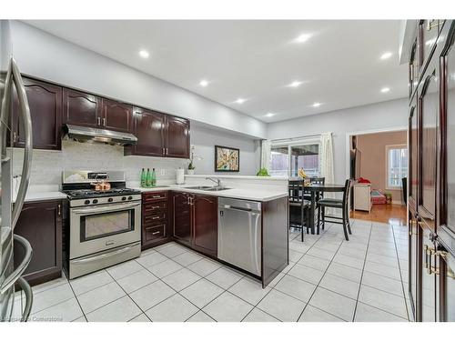 7565 Doverwood Drive, Mississauga, ON - Indoor Photo Showing Kitchen With Stainless Steel Kitchen With Double Sink