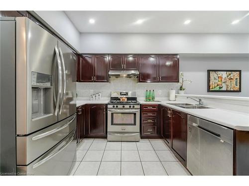 7565 Doverwood Drive, Mississauga, ON - Indoor Photo Showing Kitchen With Stainless Steel Kitchen With Double Sink