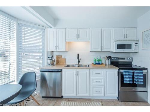 66 Arbour Glen Crescent, London, ON - Indoor Photo Showing Kitchen With Double Sink