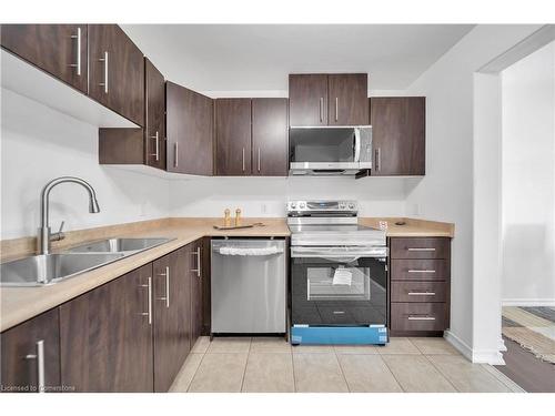 14-75 Prince William Way, Barrie, ON - Indoor Photo Showing Kitchen With Stainless Steel Kitchen With Double Sink